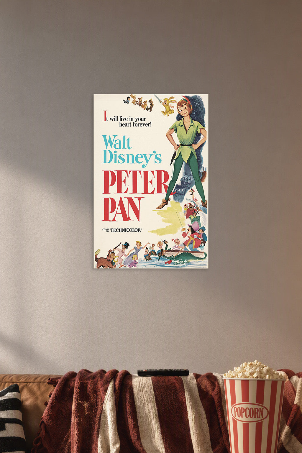 Peter Pan Disney in a cozy movie room above a brown sofa with popcorn.