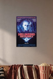 Pinhead Hellraiser II Horror Movie Poster in a cozy movie room above a brown sofa with popcorn.