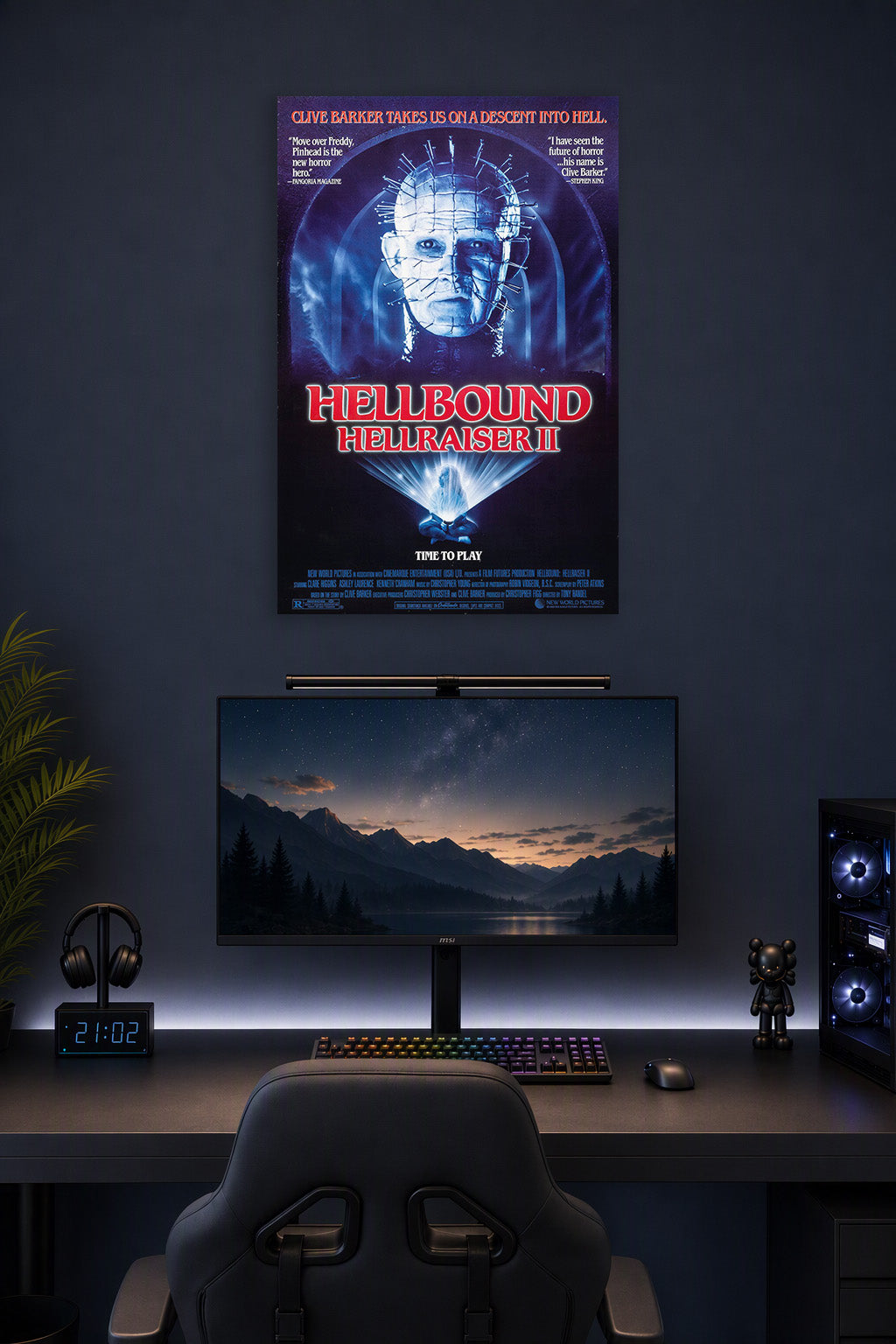 Pinhead Hellraiser II Horror Movie Poster in a gaming desk setup above a monitor.