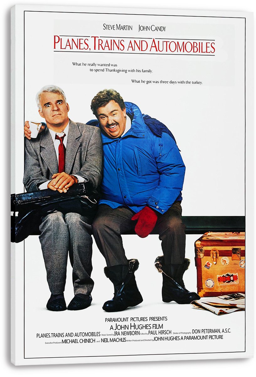Planes, Trains and Automobiles canvas wall art print with Steve Martin and John Candy on a bench beside luggage.