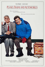Planes, Trains and Automobiles poster with Steve Martin and John Candy seated beside a stickered suitcase and papers.