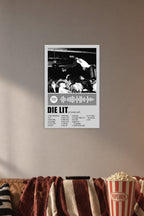 Playboi Carti Die Lit Album Art in a cozy movie room above a brown sofa with popcorn.