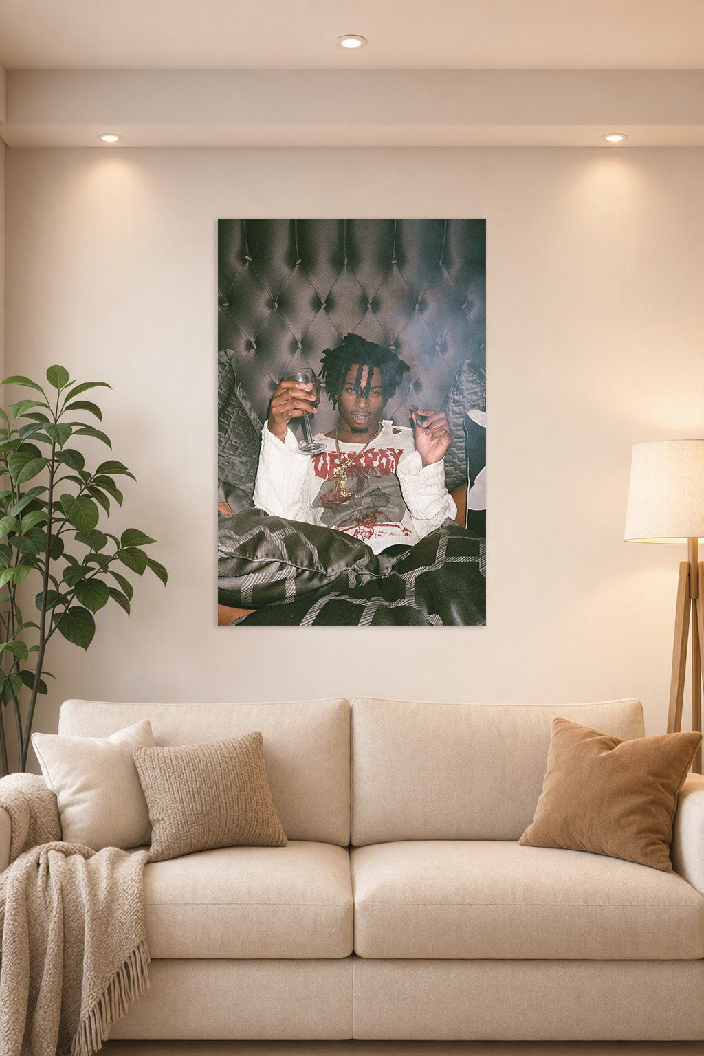 Playboi Carti Poster Musician Concert Tour Rapper in a bright living room above a beige sofa.