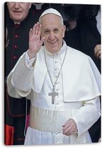 Pope Francis canvas wall art print features the smiling pontiff waving in white robes with a silver crucifix against a dark crowd.