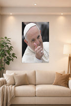 Pope Francis in a bright living room above a beige sofa.