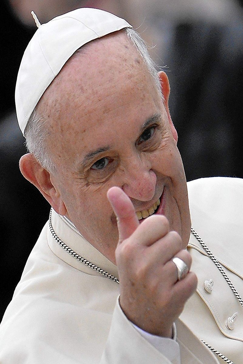 Pope Francis wall art print features a close-up of the smiling pontiff in white clerical dress giving a thumbs-up.