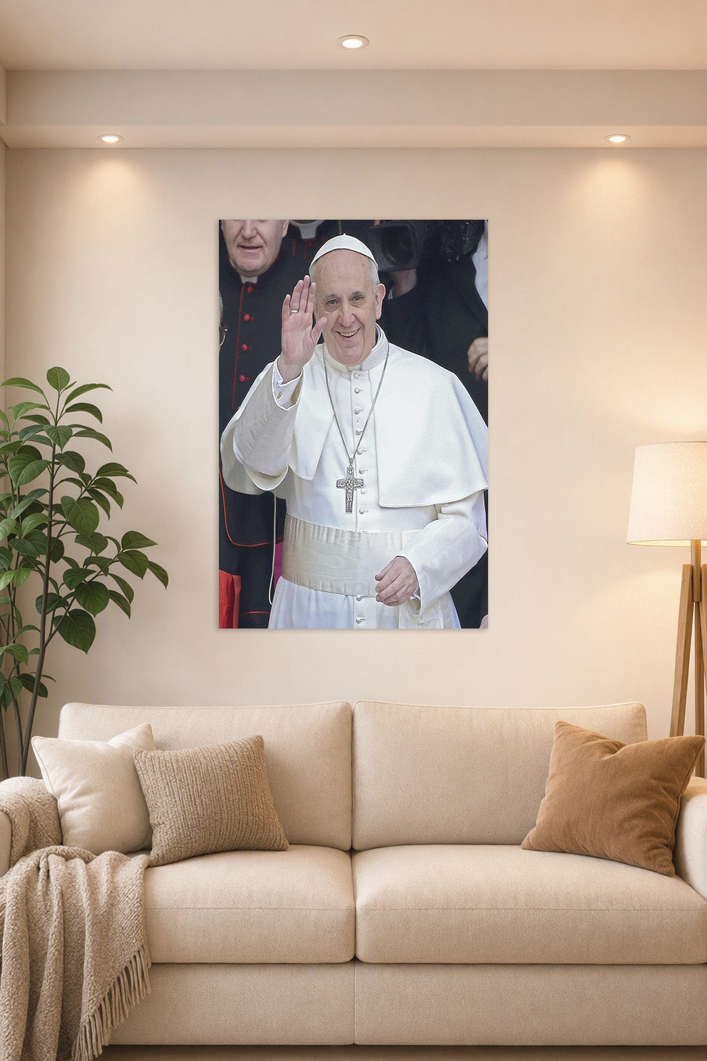 Pope Francis in a bright living room above a beige sofa.