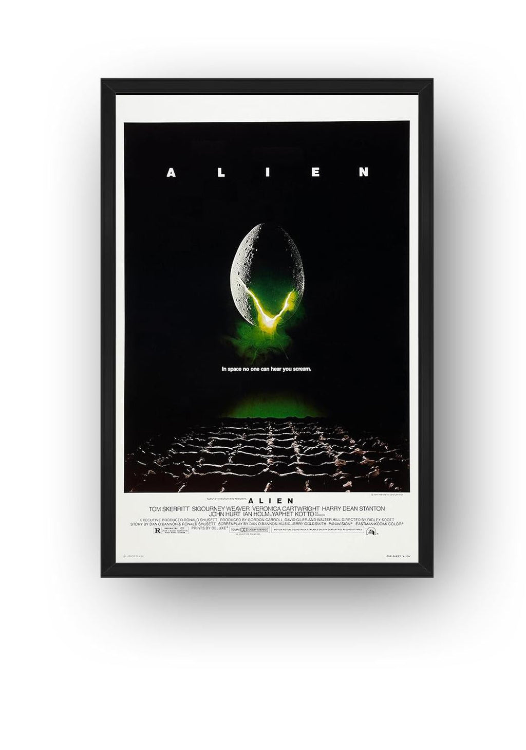 Alien movie wall art print presented in a black frame, featuring a luminous egg above a dark extraterrestrial ground.
