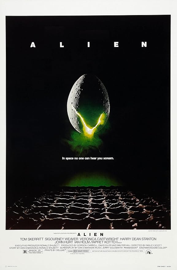 Alien movie poster paper print with a cracked egg glowing green above dark ridged terrain on a black background.