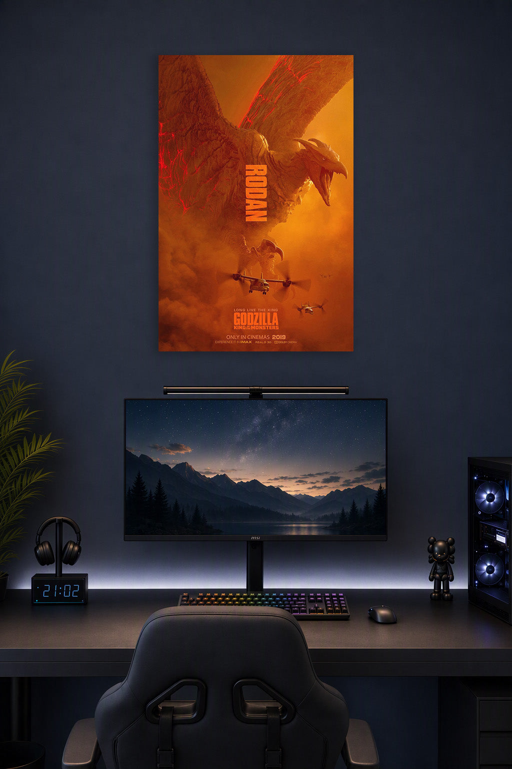 Poster Art (01) in a gaming desk setup above a monitor.