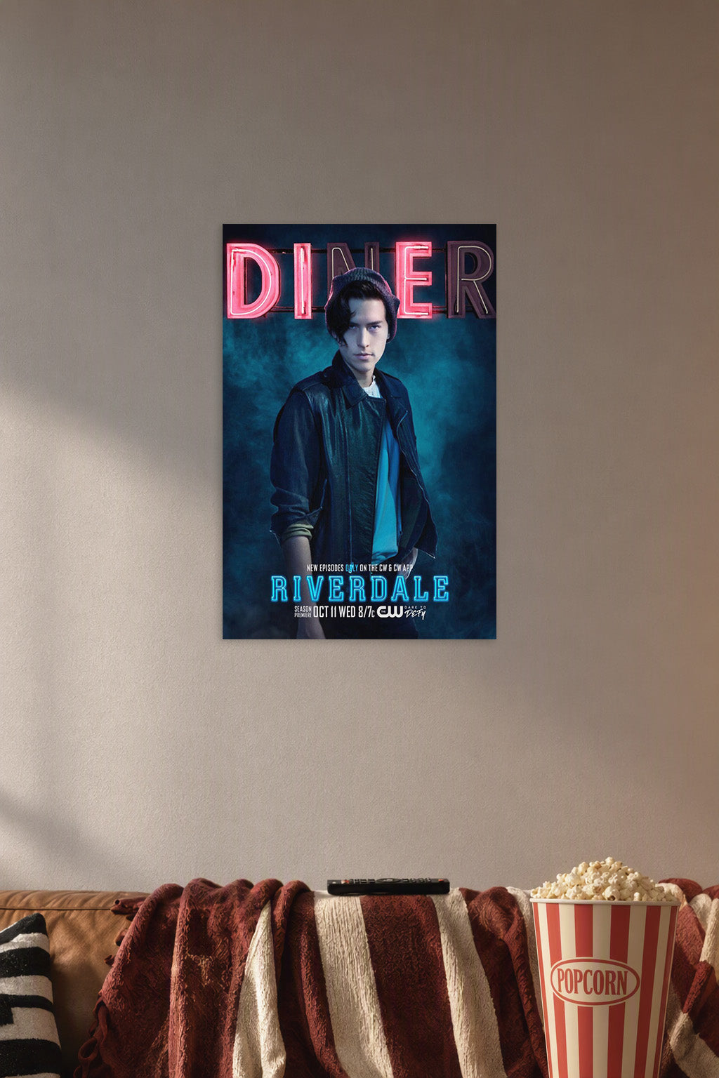 Poster Art B07CRDKFW3 in a cozy movie room above a brown sofa with popcorn.