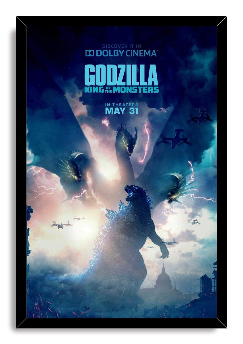 Godzilla: King of the Monsters framed wall art print shows Godzilla and King Ghidorah amid lightning, clouds, and military aircraft.
