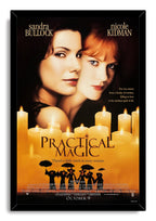 Practical Magic framed wall art print features Sandra Bullock and Nicole Kidman over candlelight, umbrella silhouettes, and warm gold typography.