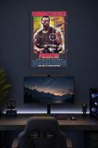 Predator (1987) Movie Poster in a gaming desk setup above a monitor.