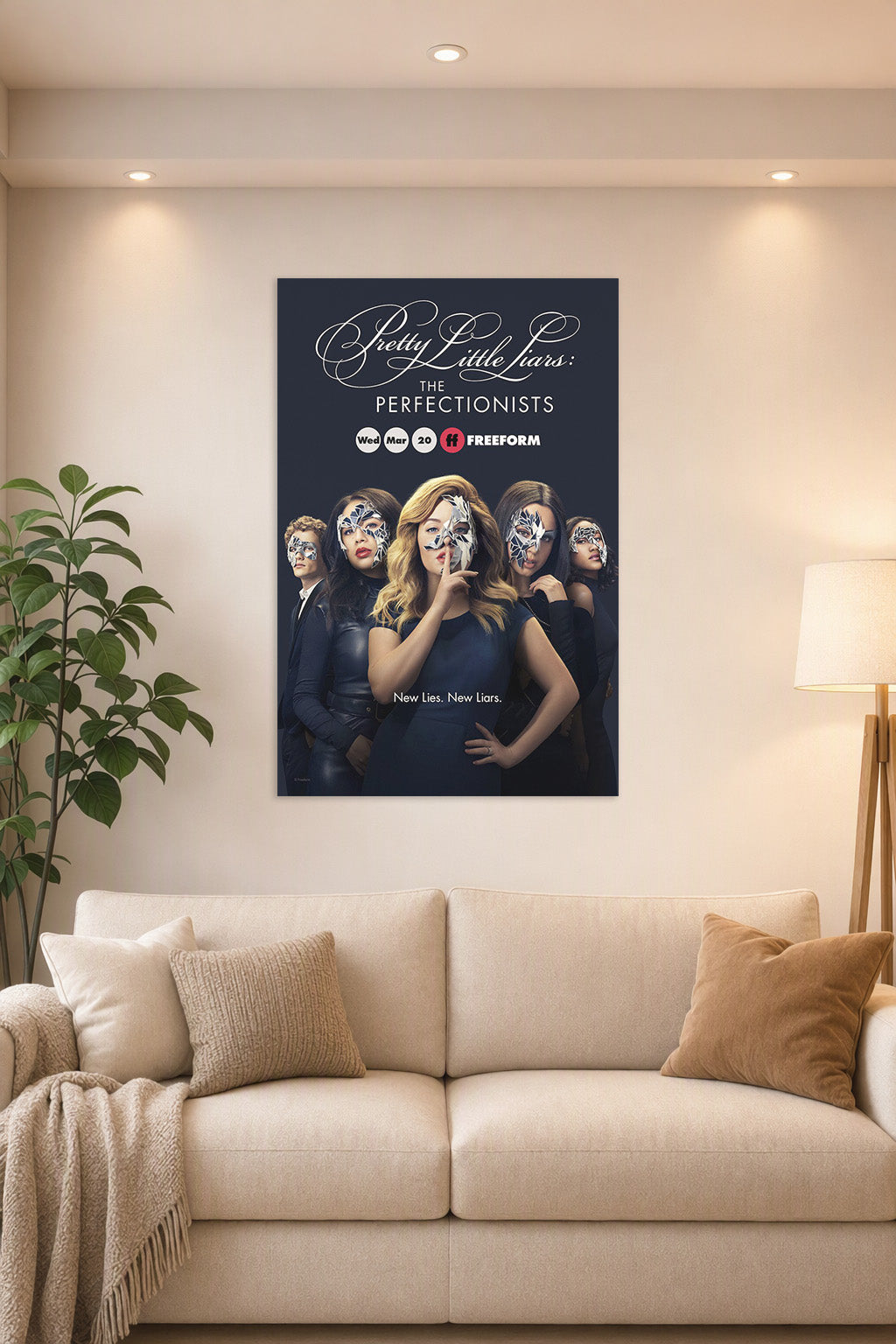 Pretty Little Liars: The Perfectionists in a bright living room above a beige sofa.