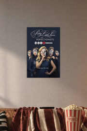 Pretty Little Liars: The Perfectionists in a cozy movie room above a brown sofa with popcorn.