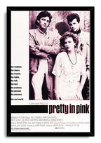 Pretty in Pink framed wall art print with a black border around three characters, pink tones, taglines, and film title.