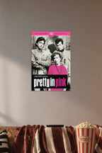 Pretty in Pink Movie Poster in a cozy movie room above a brown sofa with popcorn.