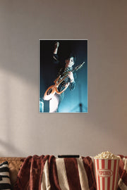 Prince-Birmingham 1995 Music in a cozy movie room above a brown sofa with popcorn.