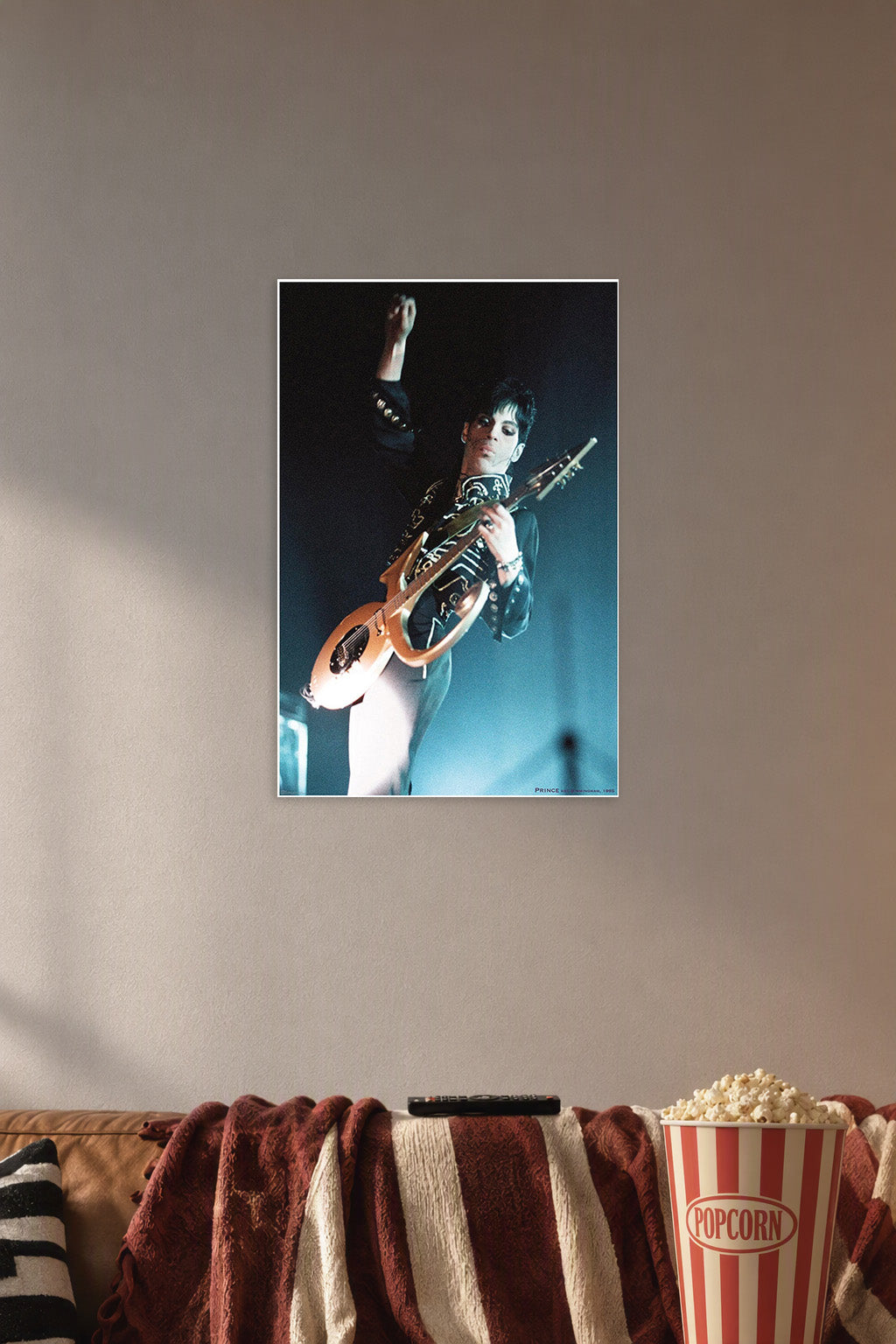 Prince-Birmingham 1995 Music in a cozy movie room above a brown sofa with popcorn.