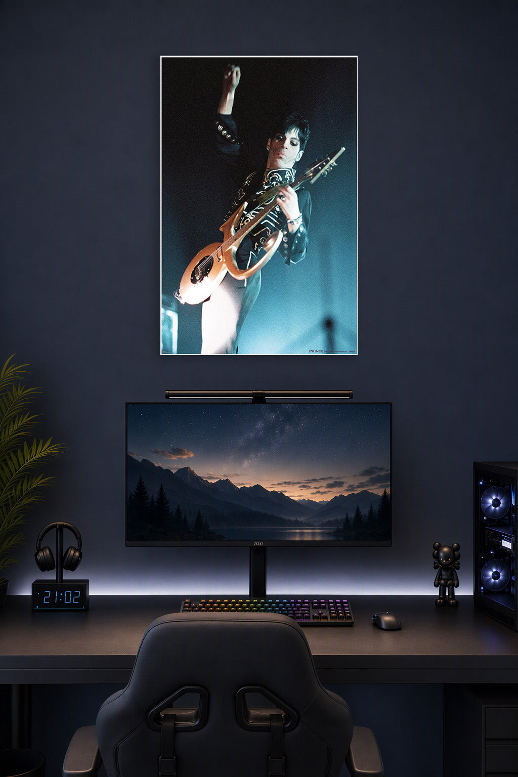 Prince-Birmingham 1995 Music in a gaming desk setup above a monitor.
