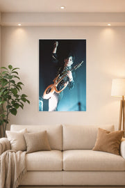 Prince-Birmingham 1995 Music in a bright living room above a beige sofa.