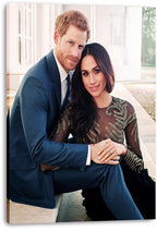 Prince Harry and Meghan Markle canvas wall art print features the couple seated together, with his arm around her and her ring visible.