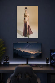 Princess Leia in a gaming desk setup above a monitor.
