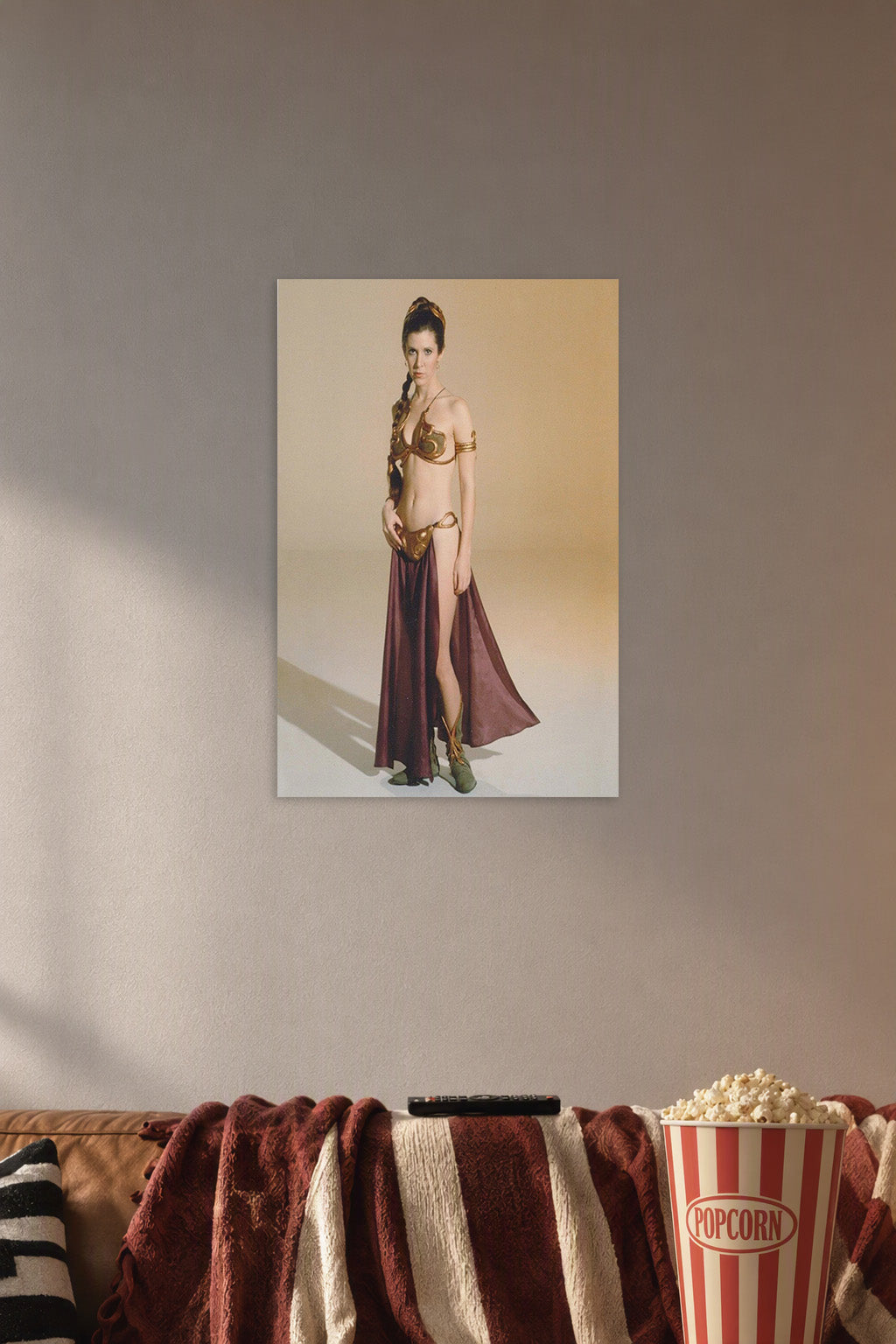 Princess Leia in a cozy movie room above a brown sofa with popcorn.