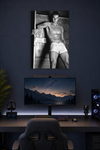 Rafael Nadal in a gaming desk setup above a monitor.