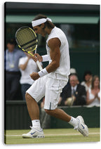 Rafael Nadal canvas wall art print presents his celebratory leap with clenched fist and yellow racket against a blurred crowd.