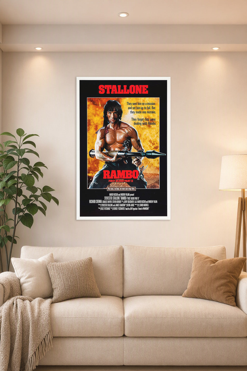 Rambo: First Blood Part II Sylvester Stallone in a bright living room above a beige sofa.