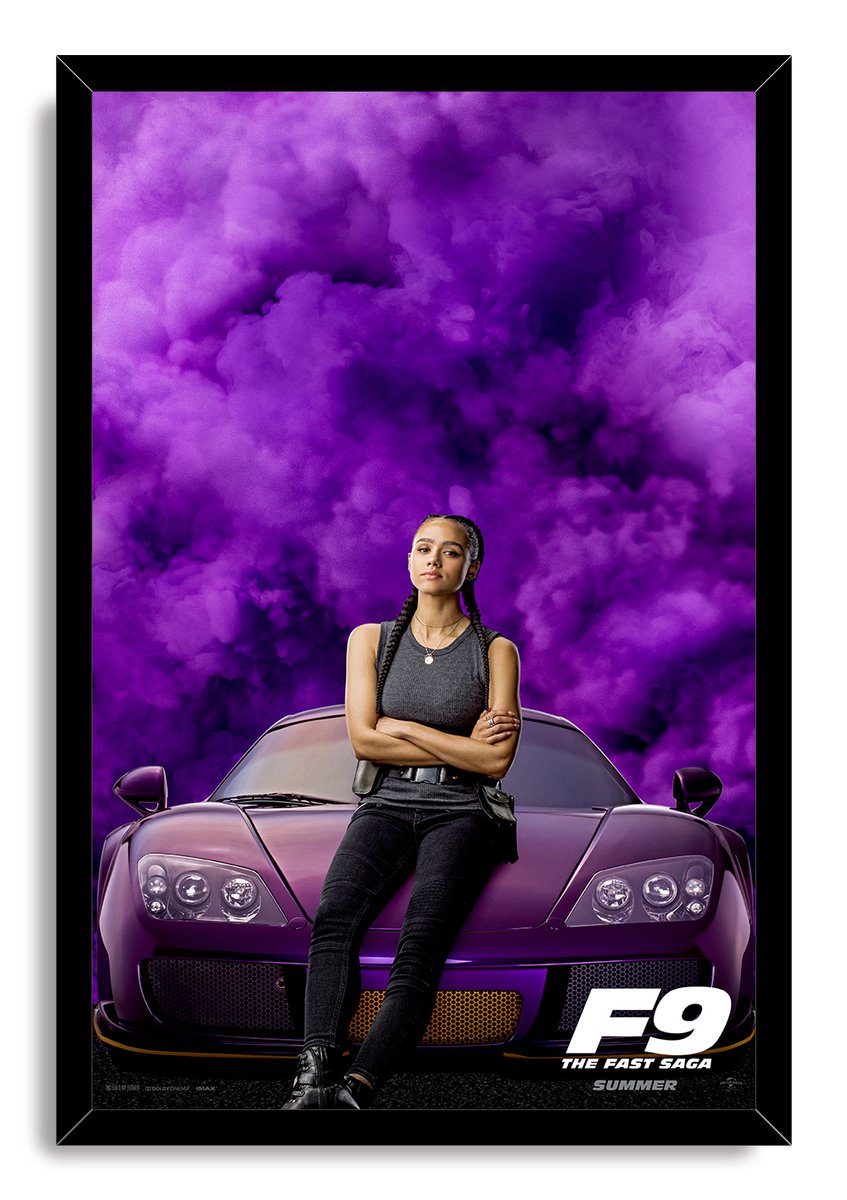F9 The Fast Saga framed wall art print with Ramsey seated before a purple sports car and dramatic violet clouds.