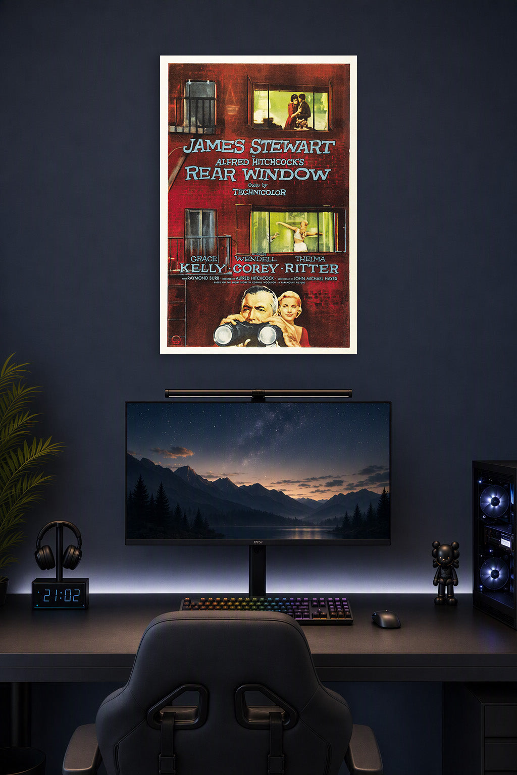Rear Window Movie Poster in a gaming desk setup above a monitor.