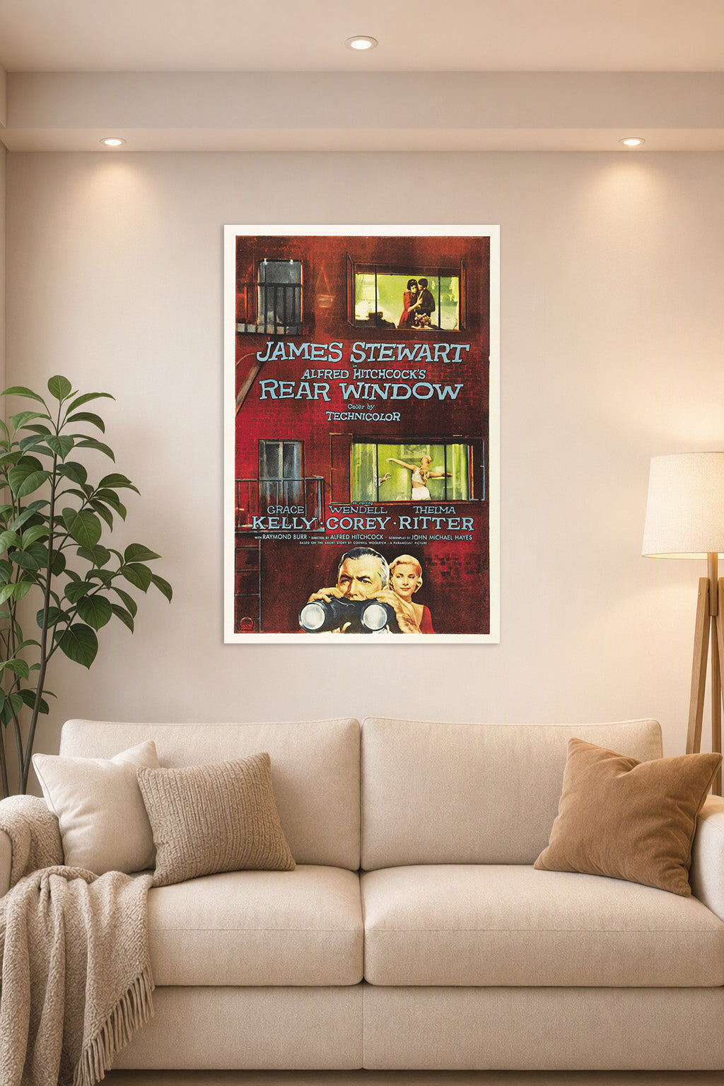 Rear Window Movie Poster in a bright living room above a beige sofa.