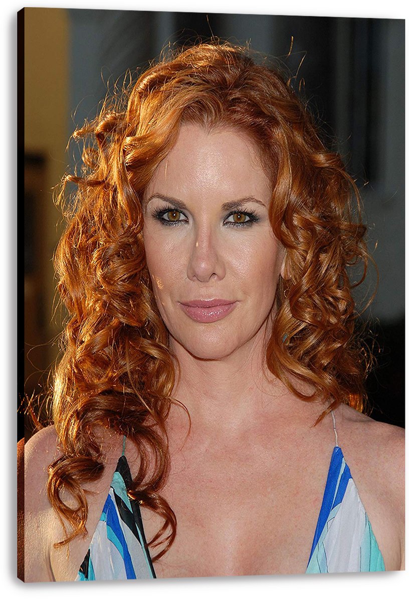 Redhead celebrity canvas wall art print featuring a close-up portrait with voluminous copper curls and a patterned blue dress.
