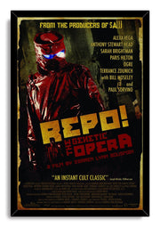 Repo! The Genetic Opera framed wall art print with a black border, red masked figure, blue goggles, and distressed yellow title lettering.