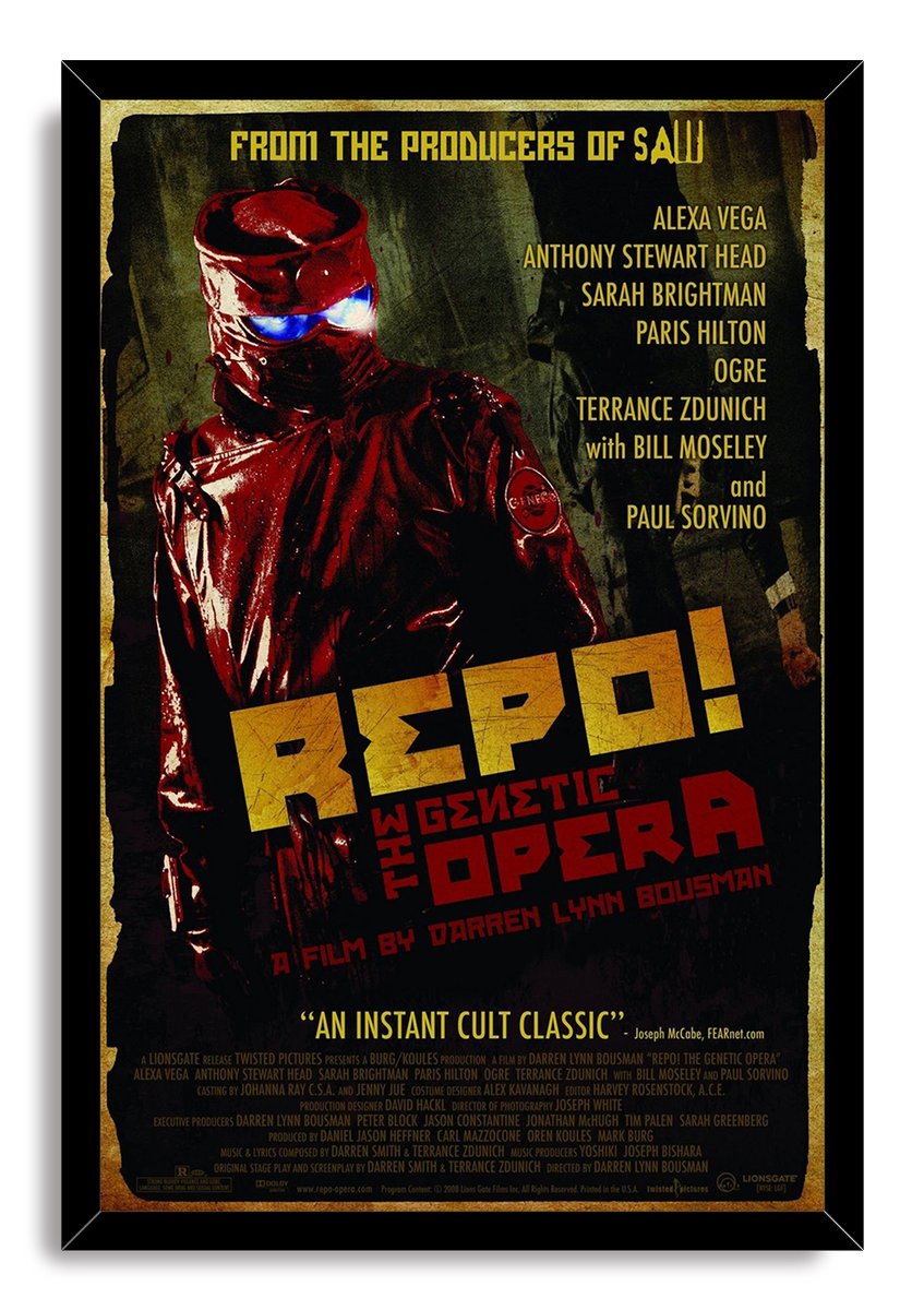 Repo! The Genetic Opera framed wall art print with a black border, red masked figure, blue goggles, and distressed yellow title lettering.