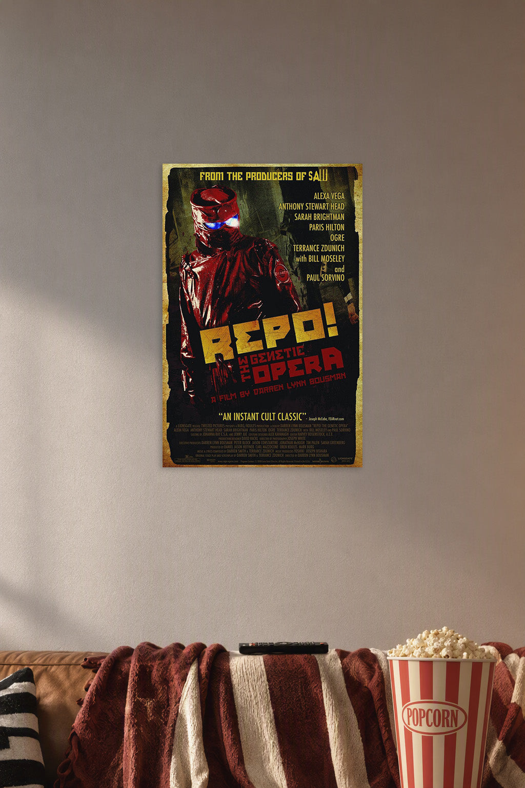 Repo! The Genetic Opera Movie Poster in a cozy movie room above a brown sofa with popcorn.