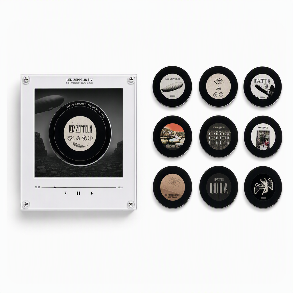 Retro mini vinyl record music player with a Led Zeppelin IV design beside nine interchangeable album-art magnetic discs.
