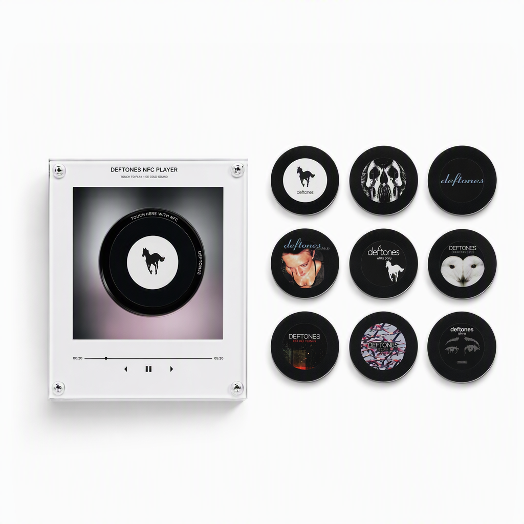 Retro mini vinyl record music player with a Deftones horse-logo disc and nine matching interchangeable black discs.