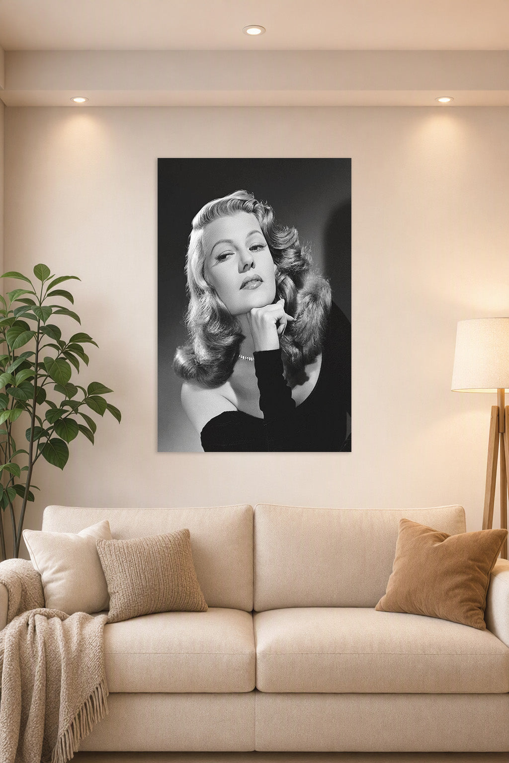 Rita Hayworth in a bright living room above a beige sofa.