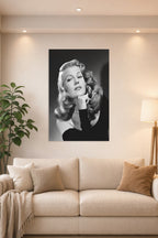 Rita Hayworth in a bright living room above a beige sofa.