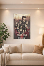 Riverdale Cast in a bright living room above a beige sofa.