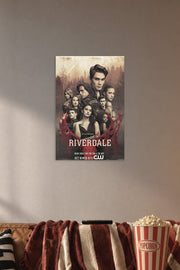 Riverdale Cast in a cozy movie room above a brown sofa with popcorn.