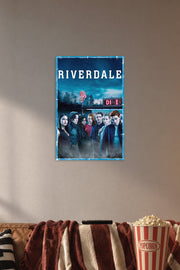 Riverdale TV Show Main Cast in a cozy movie room above a brown sofa with popcorn.
