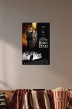 Robin Hood Prince of Thieves Movie Poster in a cozy movie room above a brown sofa with popcorn.
