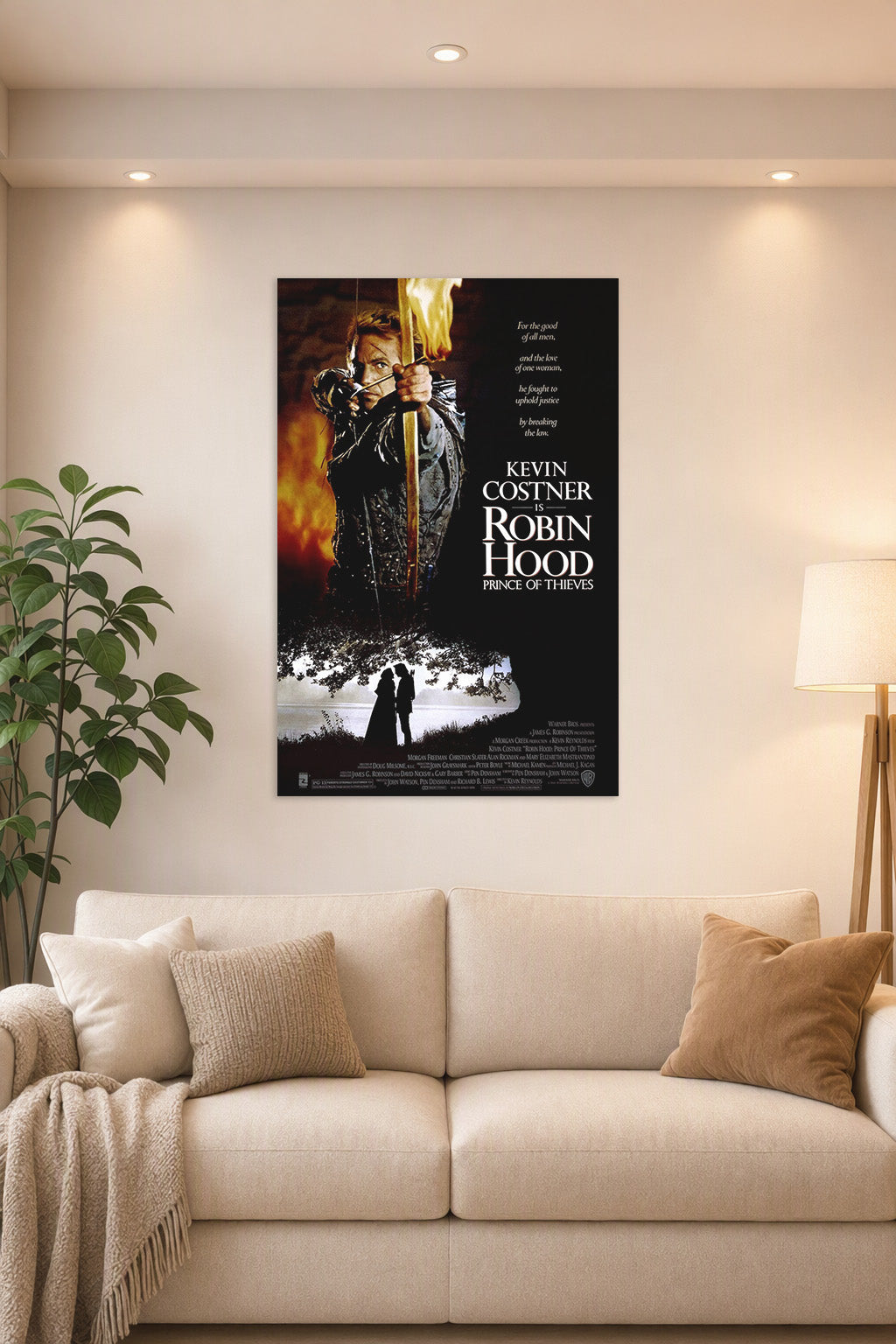 Robin Hood Prince of Thieves Movie Poster in a bright living room above a beige sofa.