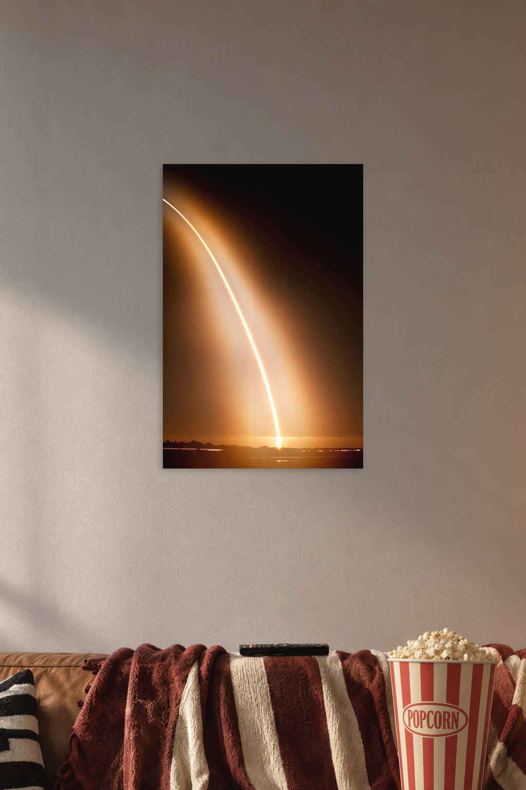 Rocket Launch Light Trail in a cozy movie room above a brown sofa with popcorn.