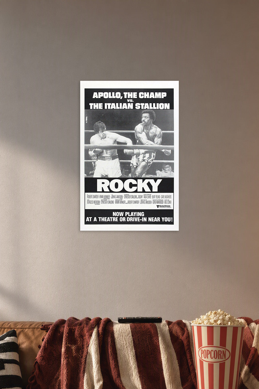 Rocky Balboa Apollo Creed Boxing Match in a cozy movie room above a brown sofa with popcorn.